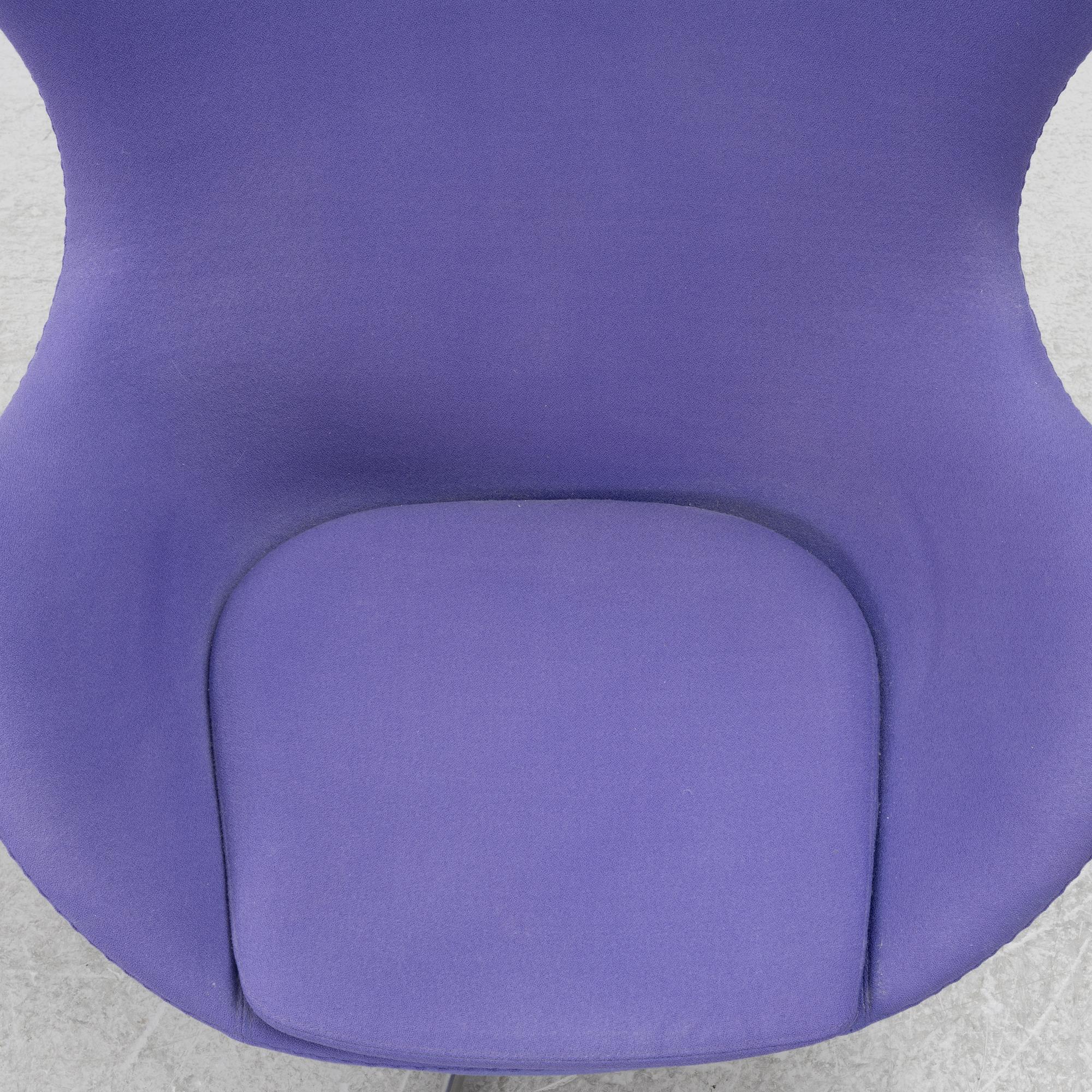 Arne Jacobsen, an armchair with footstool, "The Egg", Fritz Hansen, Denmark, 2003.