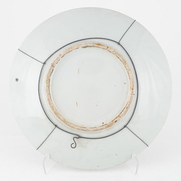A Kanton porcelain dish and two porcelain plates, China, 19th century.