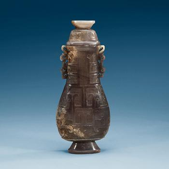 1407. A large archaistic vase with cover, presumably chalcedony, China.