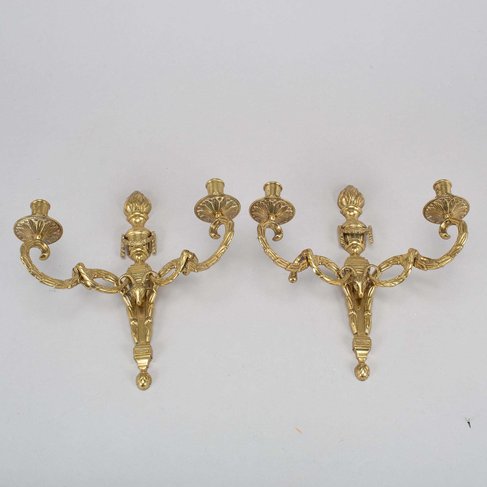 A pair of brass wall lights, Louis XVI-style, 20th century.