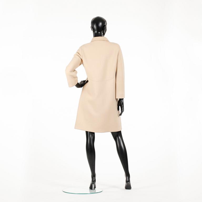 GUY LAROCHE, a beige coat, 1960's.