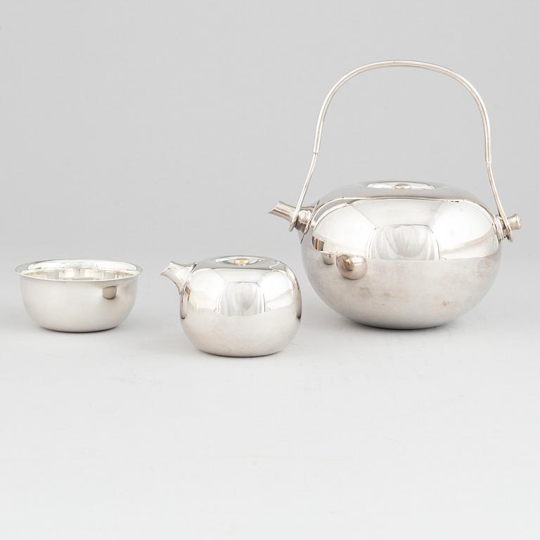 Vivianna Torun Bülow-Hübe, an electroplated brass teapot, a creamer and a sugarbowl, Dansk International Designs Ltd.