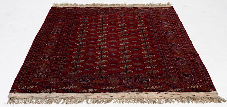 An old Turkmen carpet, c. 235 x 175 cm.