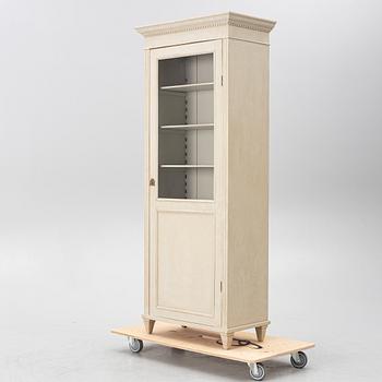 Display cabinet, early 20th century.