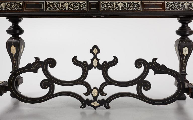 A Renaissance-style ebony, ebonized and ivory-inlaid library table, late 19th century, presumably Germany.