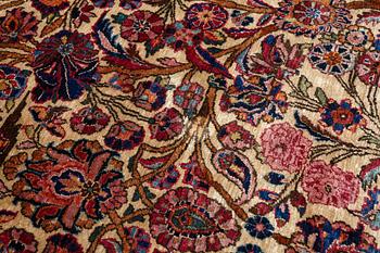 A carpet, a semi-antique silk Kashan, ca 317 x 207-210,5 cm.