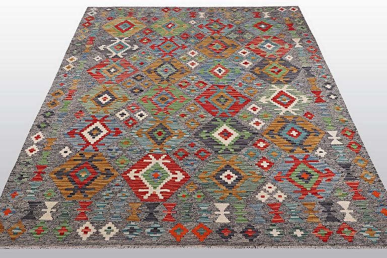 A rug, kilim, ca 244 x 174 cm.