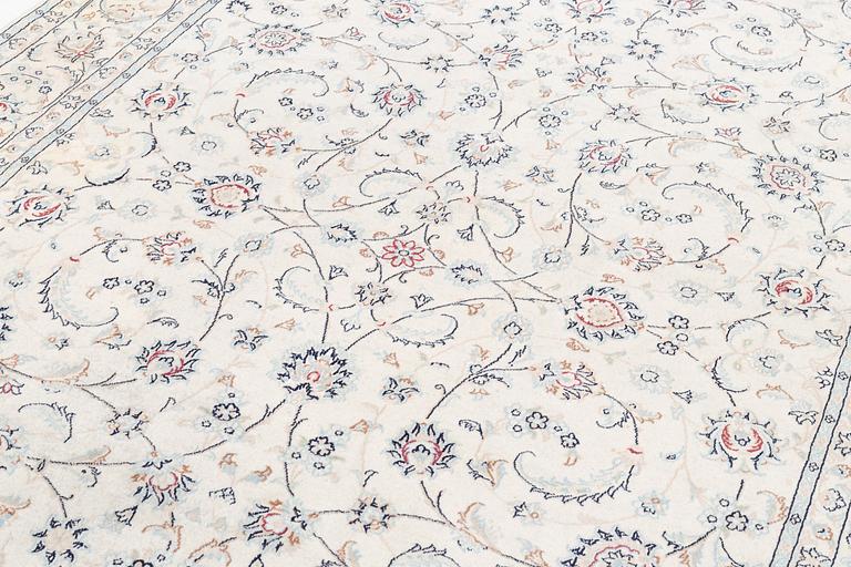 Rug, Nain, part silk, latter part of the 20th century, 293 x 198 cm.