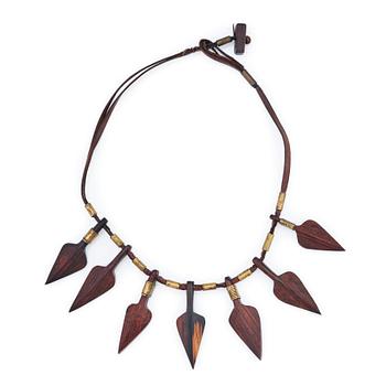 65. Vivianna Torun Bülow-Hübe, a leather, wood and brass necklace, executed in her own studio, Stockholm ca 1950.