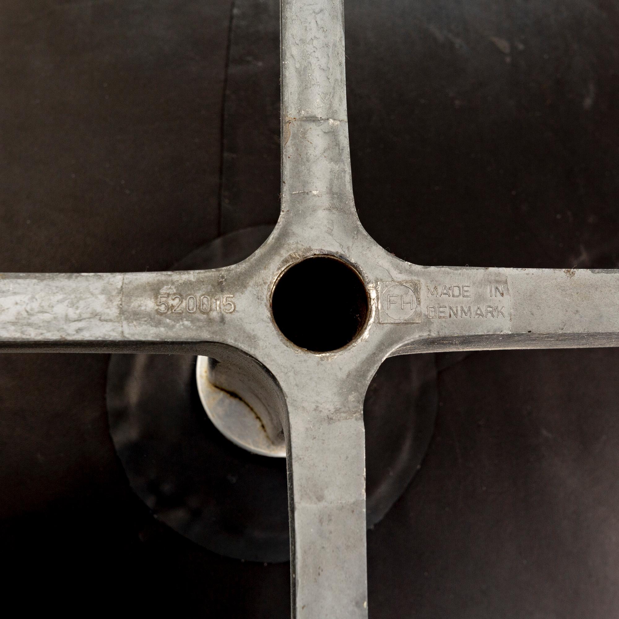 An Arne Jacobsen, aluminium and leather armchair, "Ägget" for Fritz Hansen designed in 1958.