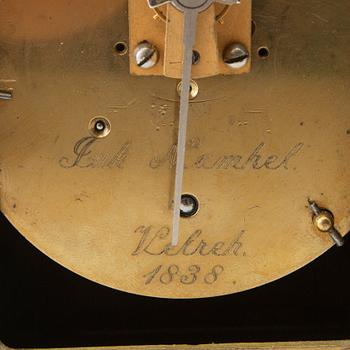 Neo-Gothic table clock, signed and dated in the work 1838.