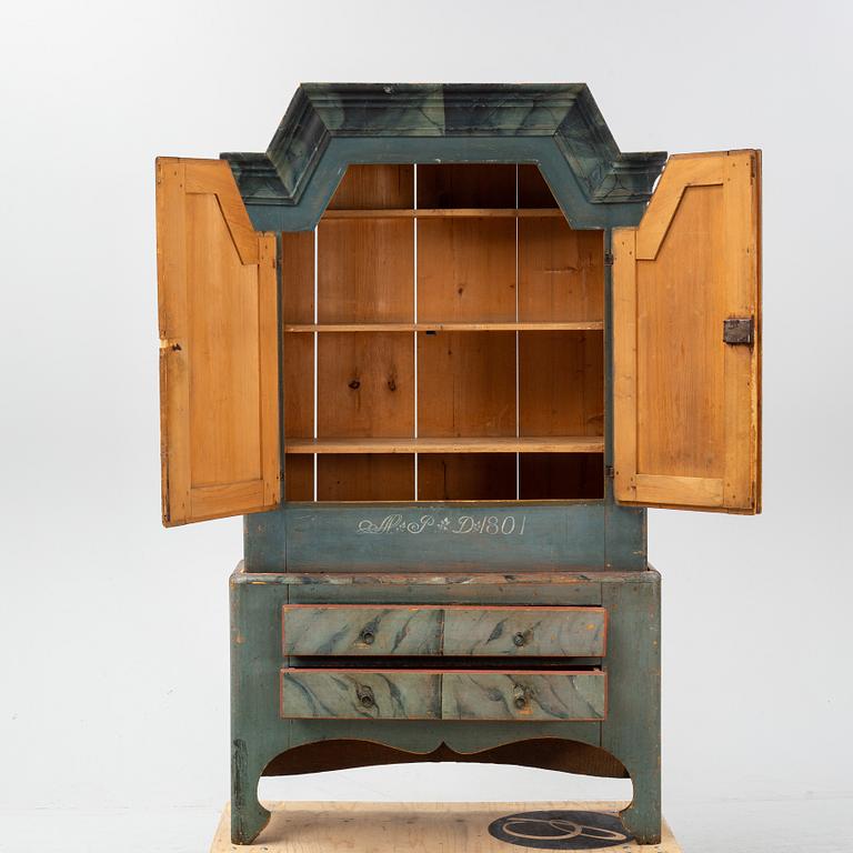 A painted Swedish cabinet from Jämtland, dated 1801.