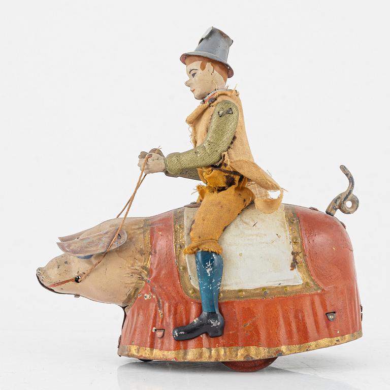 Lehmann, A tinplate 'Paddys dancing pig' Germany. In production 1903-35.