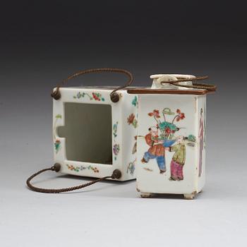 A teapot with cover and separate warmer, decorated with figures and flowers, Qing Dynasty, 19th Century.