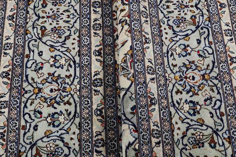 A carpet, Kashan, ca 355 x 247 cm.