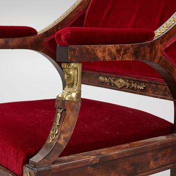 A pair of Empire style armchairs, first half of the 20th century.