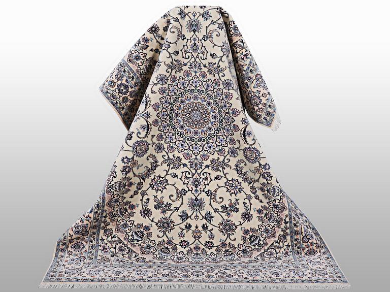 A Nain carpet, part silk, 6 laa, c. 250 x 160 cm.