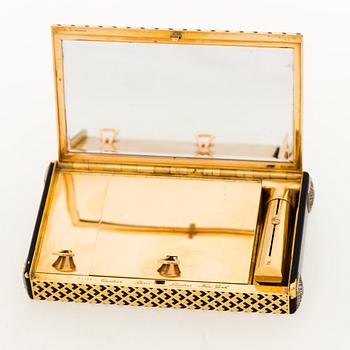 Cartier Art Deco Vanity Case 18K guld med svart emalj och baguette- och rosenslipade diamanter.