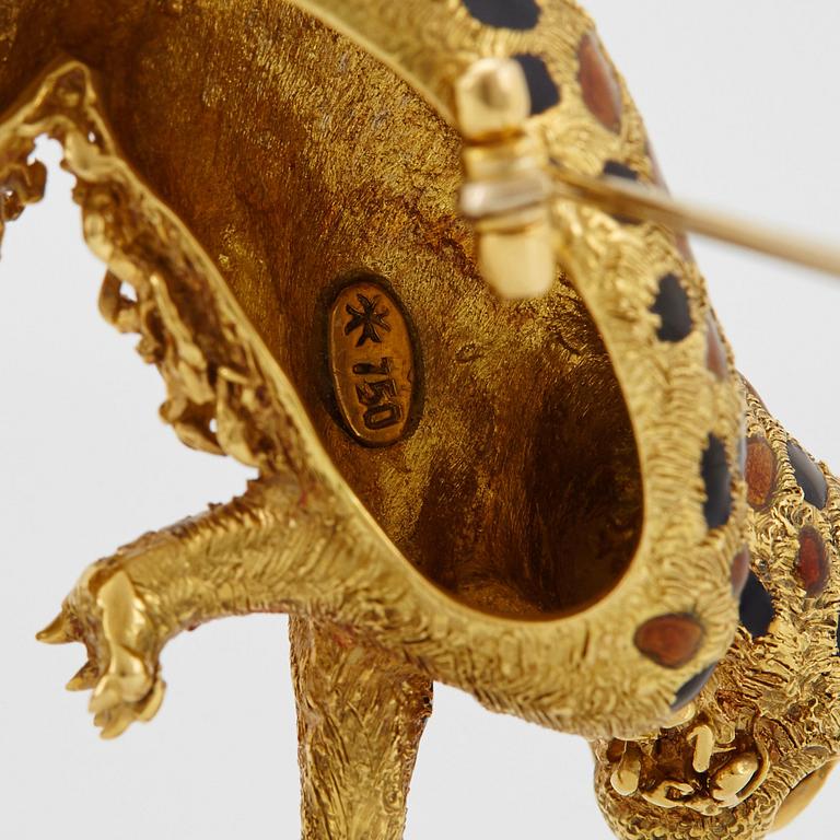 Brosch 18K guld med runda briljantslipade diamanter, safirer och smaragder samt med emaljdekor.