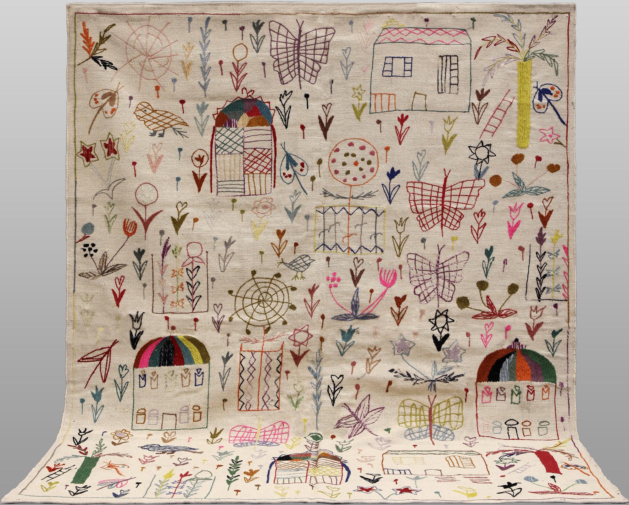 A Kelim rug, hand-embroidered, 241 x 179 cm.