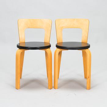 Alvar Aalto, four 1950s chairs, model 65, Artek.
