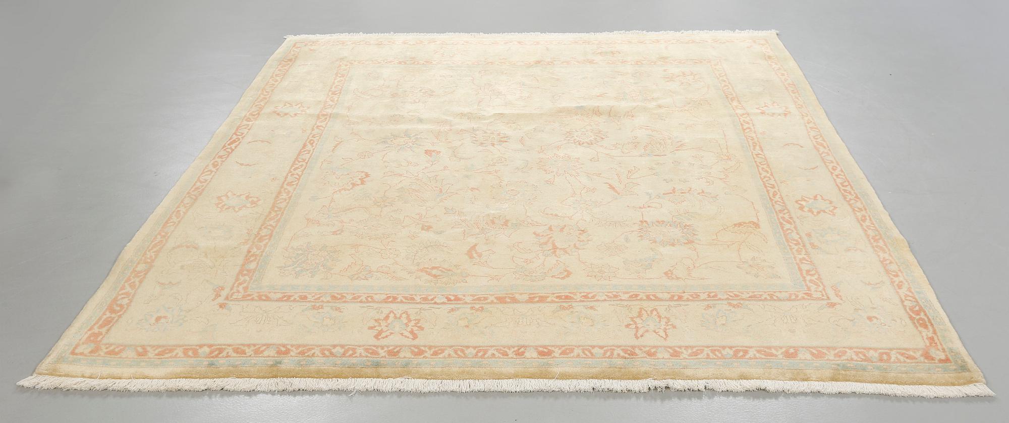 A Ziegler design rug, 230 x 221 cm.
