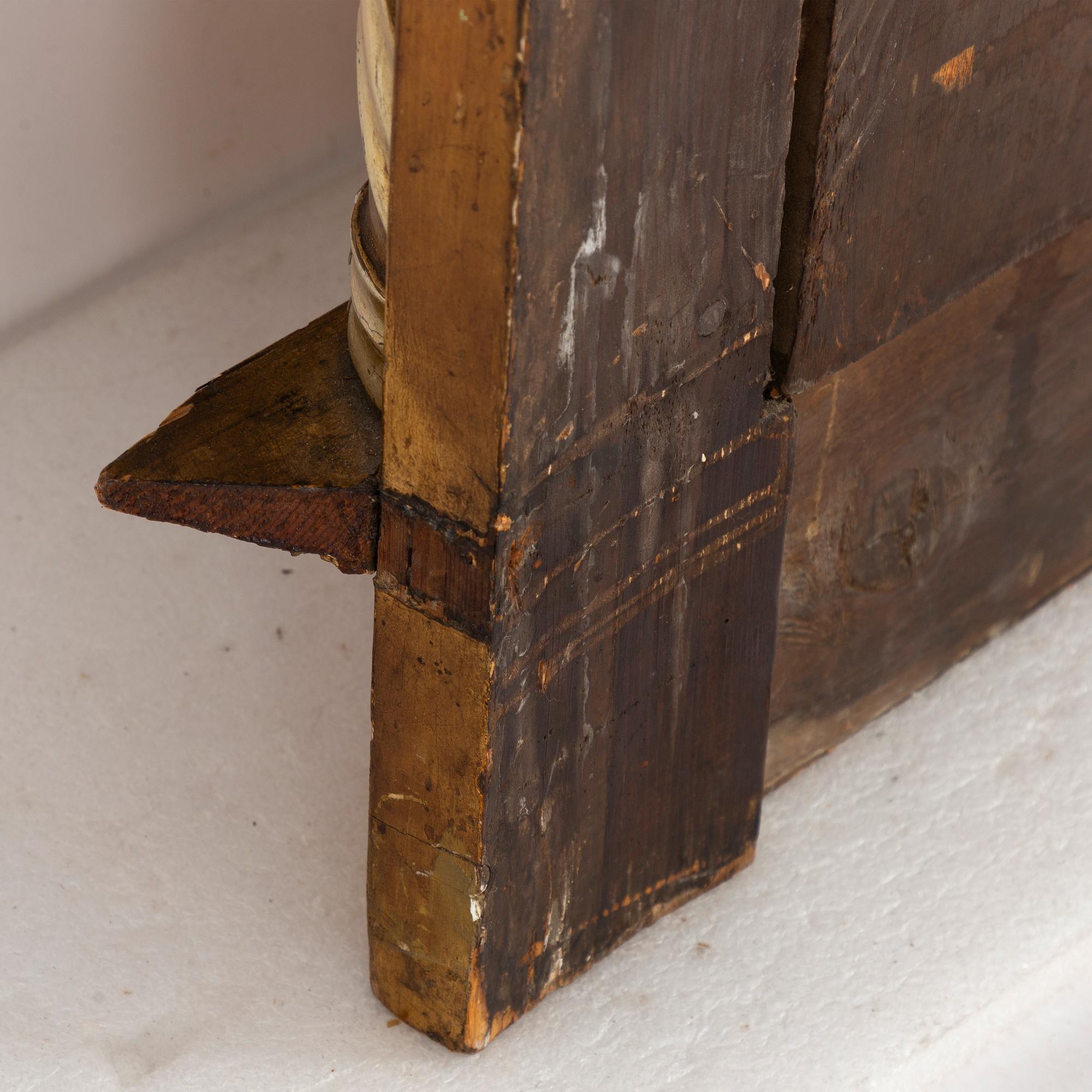 An Empire mirror, first half of the 19th century.