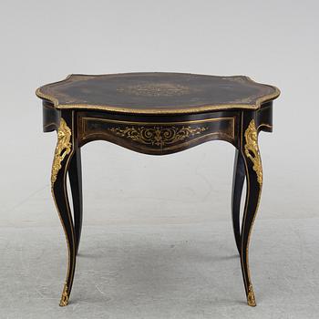 A Louis XV style table, early 20th Century.