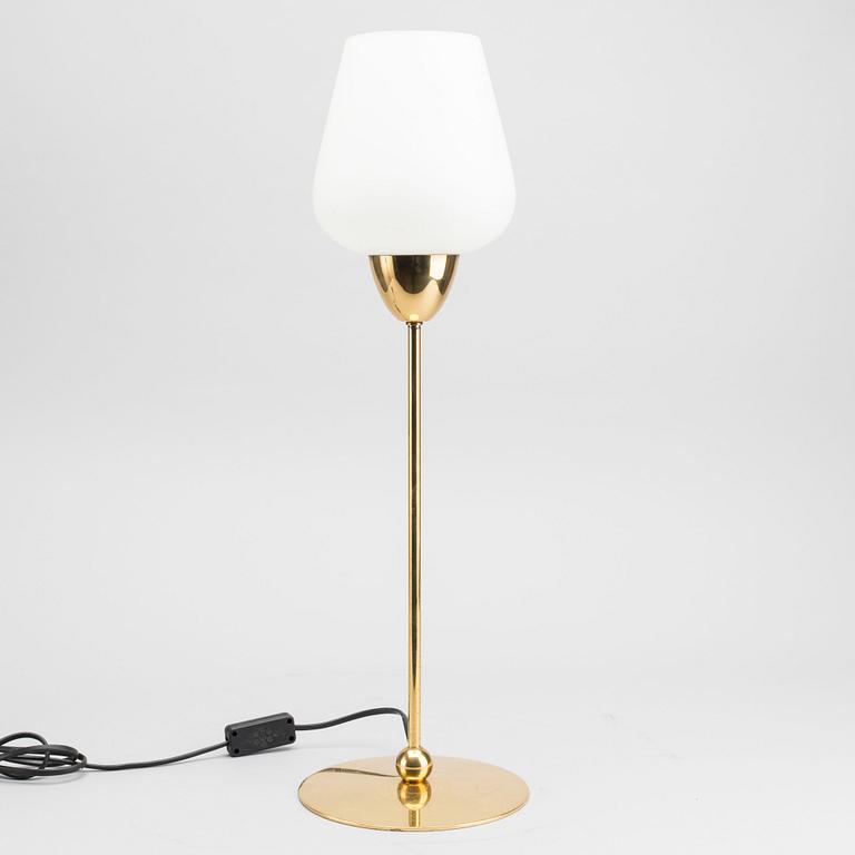 A LUMESS TABLE LAMP MADE IN SWITZERLAND.