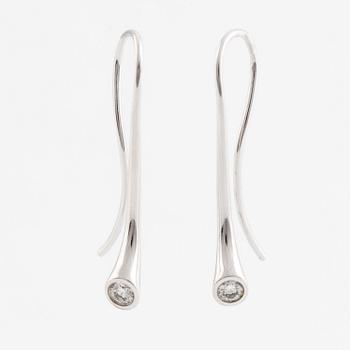 A pair of Georg Jensen 18K white gold earrings set with round brilliant-cut diamonds.