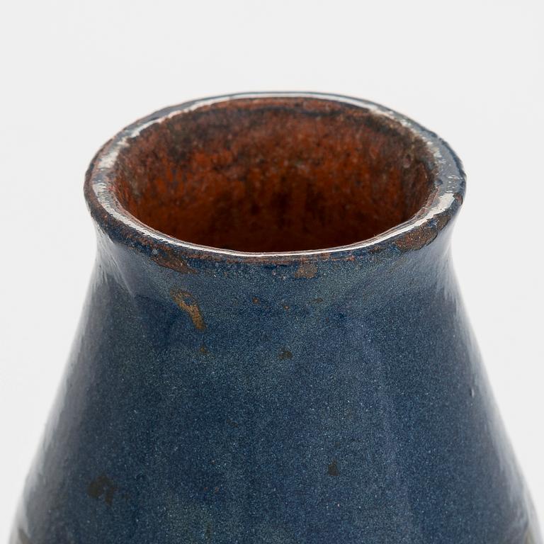 Sigrid Wickström-Paaer, a red clay vase signed SW and dated 1908.