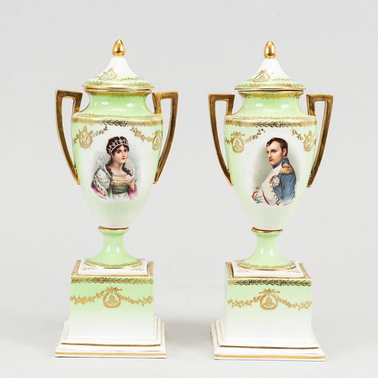 A pair of porcelain urns, possibly naples, first half of the 20th century.
