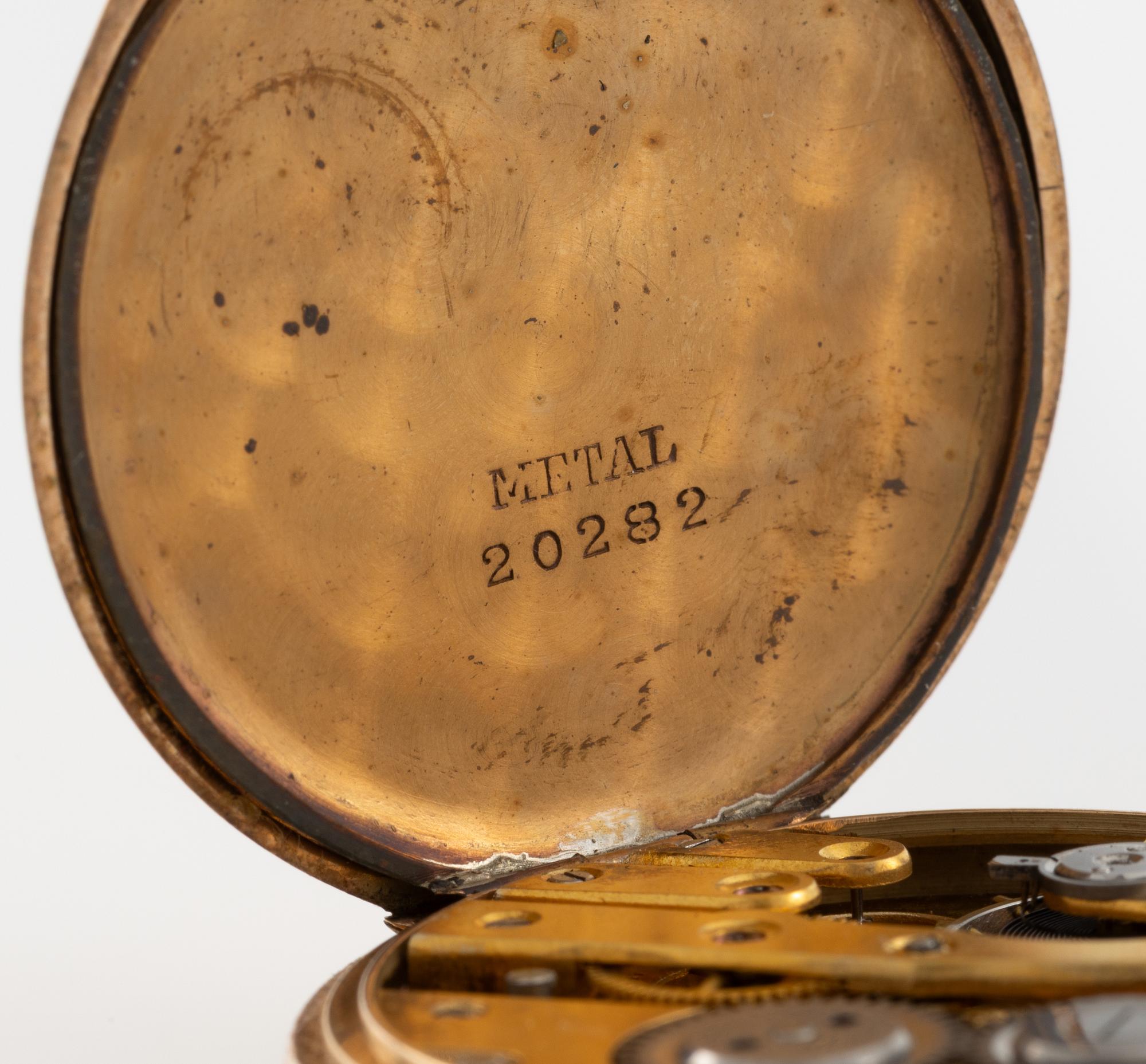 Pocket watch, 14K gold, with stand, 33 mm.