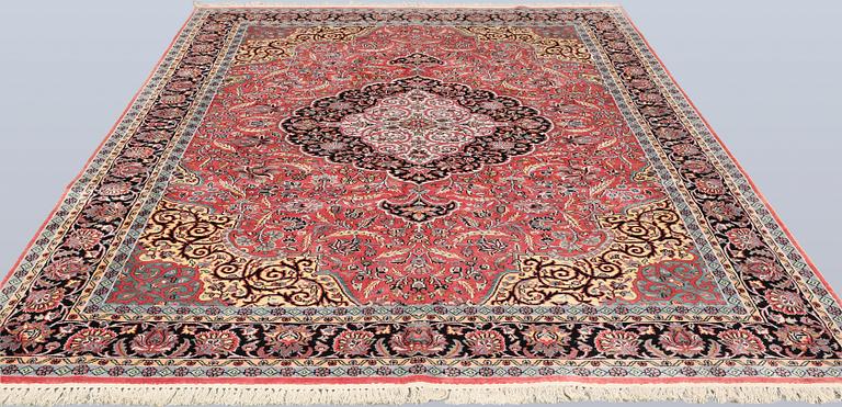 A Kashmir silk carpet, approx. 305 x 216 cm.