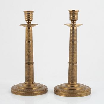 Candlesticks, a pair, Empire style, 20th century.