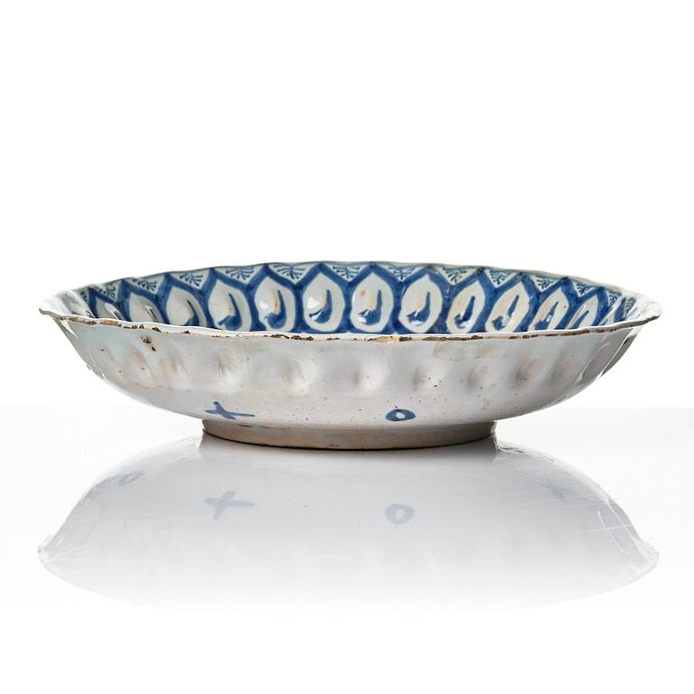 A group of three faience dishes, 18th century.
