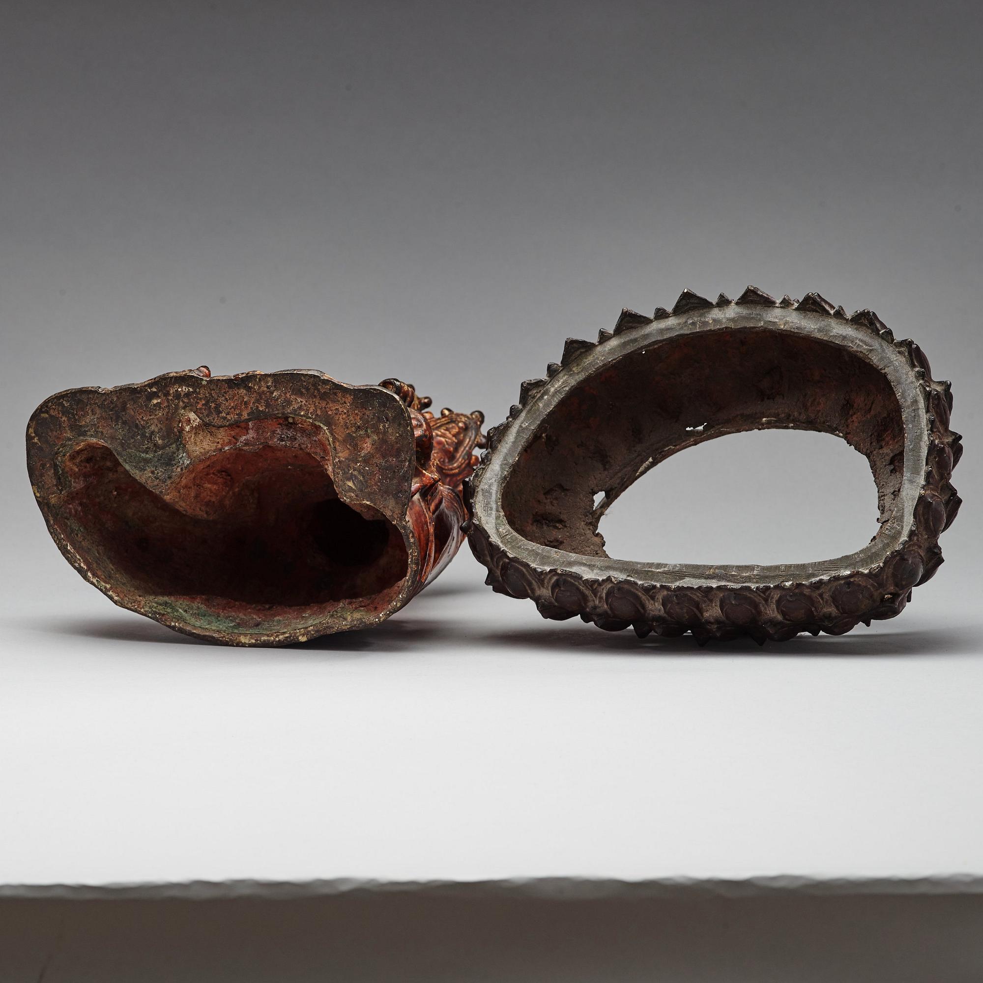 A large seated bronze figure of budhai, Ming dynasty (1368-1644).