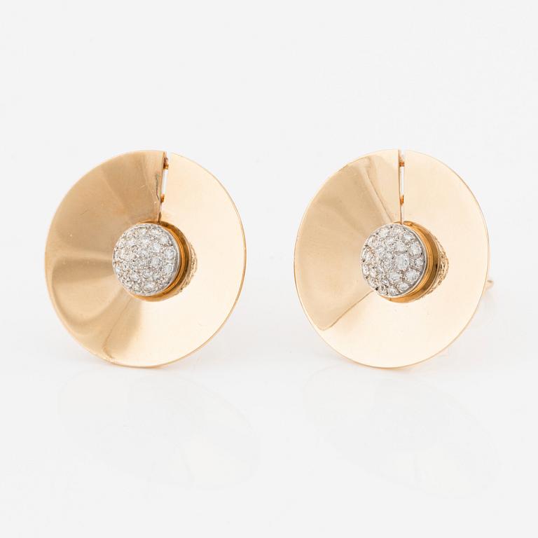 A pair of 18K gold Trudel earrings set with round brilliant-cut diamonds.