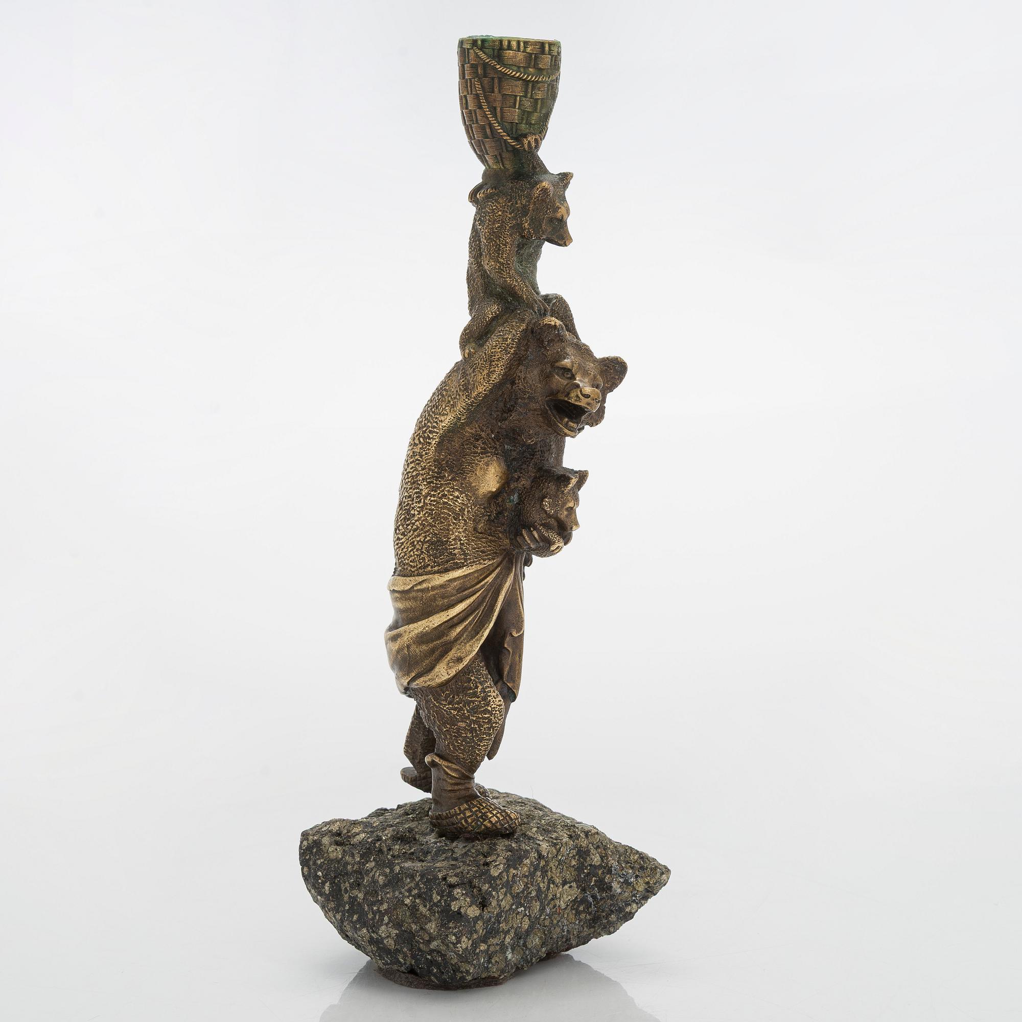 A Russian bronze candle holder, circa 1900.