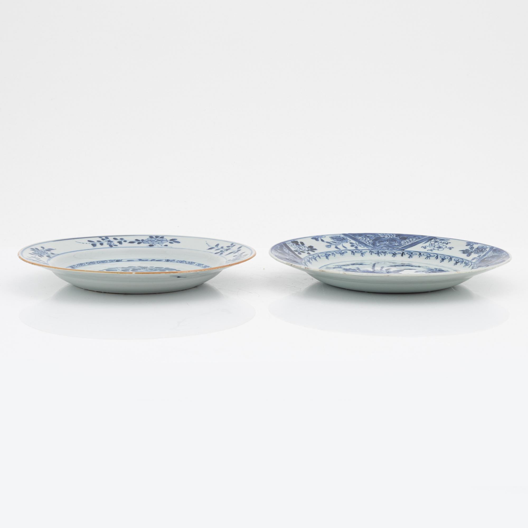 A blue and white serving dish and eight odd plates, Qing dynasty, 18th Century.