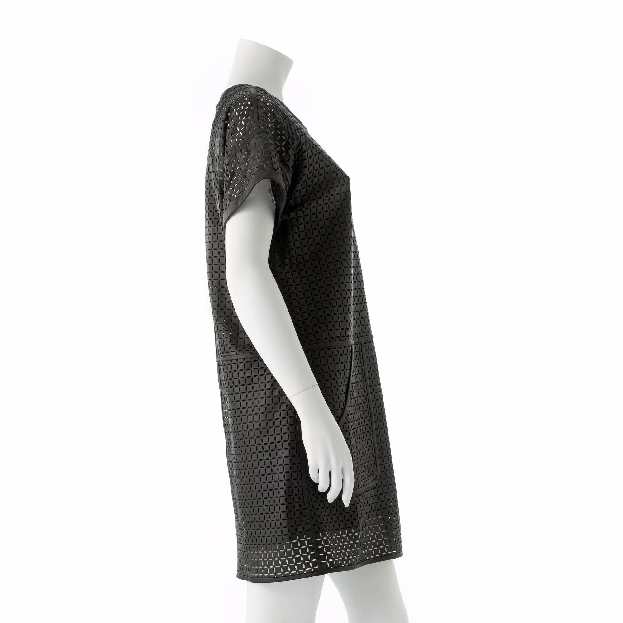 ESCADA SPORT, a black openwork leather dress.