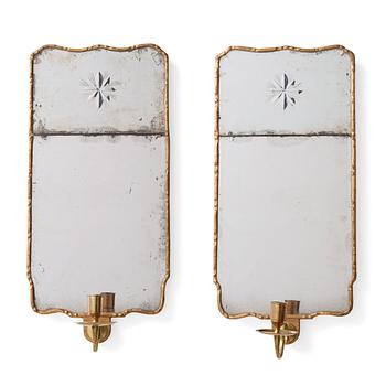 48. A pair of Swedish Rococo 18th century one-light girandole mirrors.