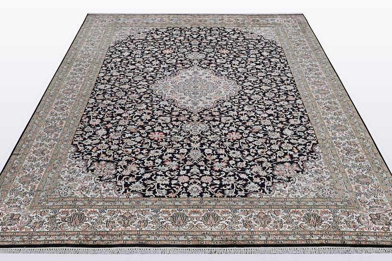 A carpet, silk Kashmir, ca 279 x 195 cm.