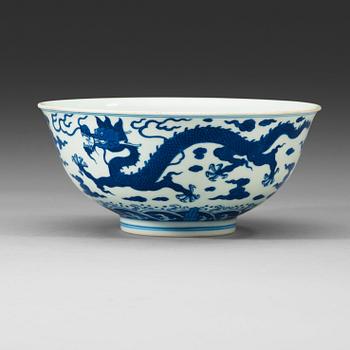 31. A well painted  blue and white bowl, Qing dynasty, 18th century, with a four character hall mark.