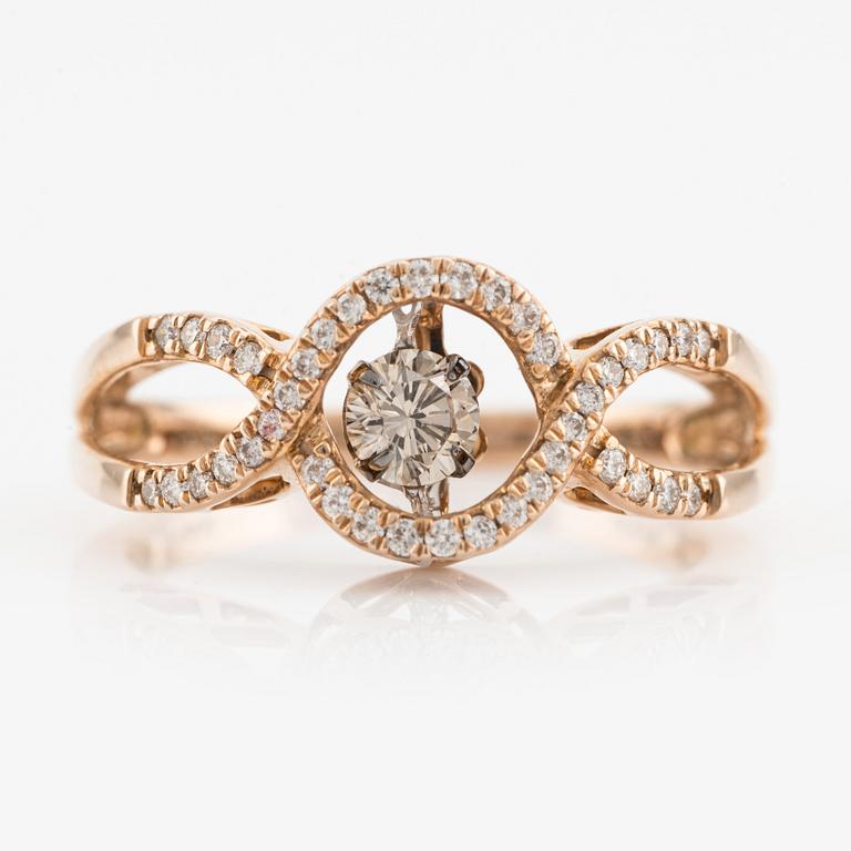 Ring, "Den dansande diamanten" med briljantslipade diamanter.