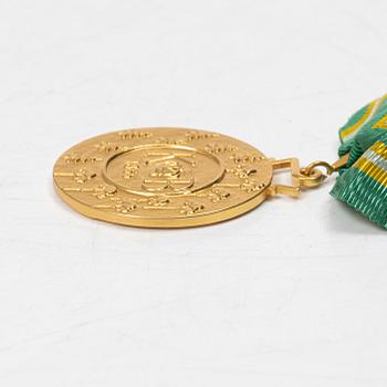 An 18K gold medal, Sporrong, Stockholm 1958.