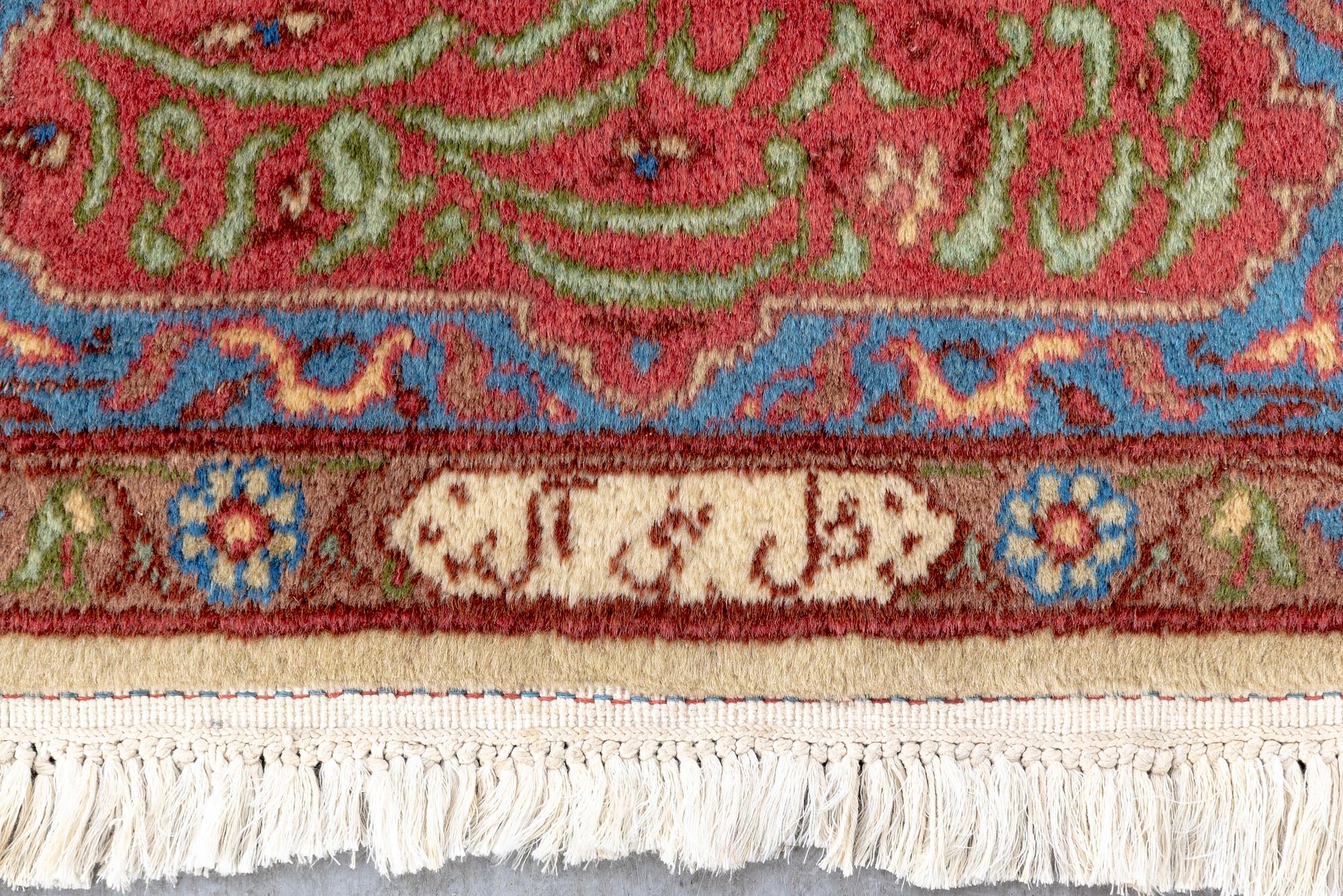 A semiantique signed Tabris carpet ca 274x189 cm.