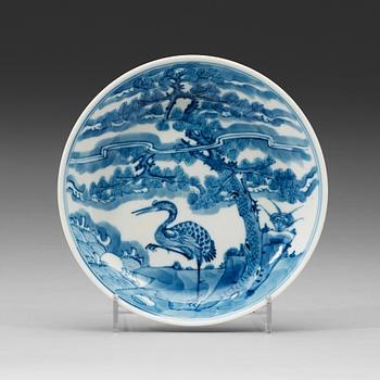 A blue and white dish, Qing dynasty, with Guangxus six character mark and of the period (1875-1908).