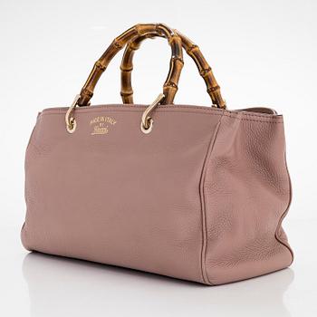 Gucci, a 'Bamboo shopper' bag.