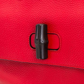 Gucci, a 'Bamboo Daily Top Handle' bag.